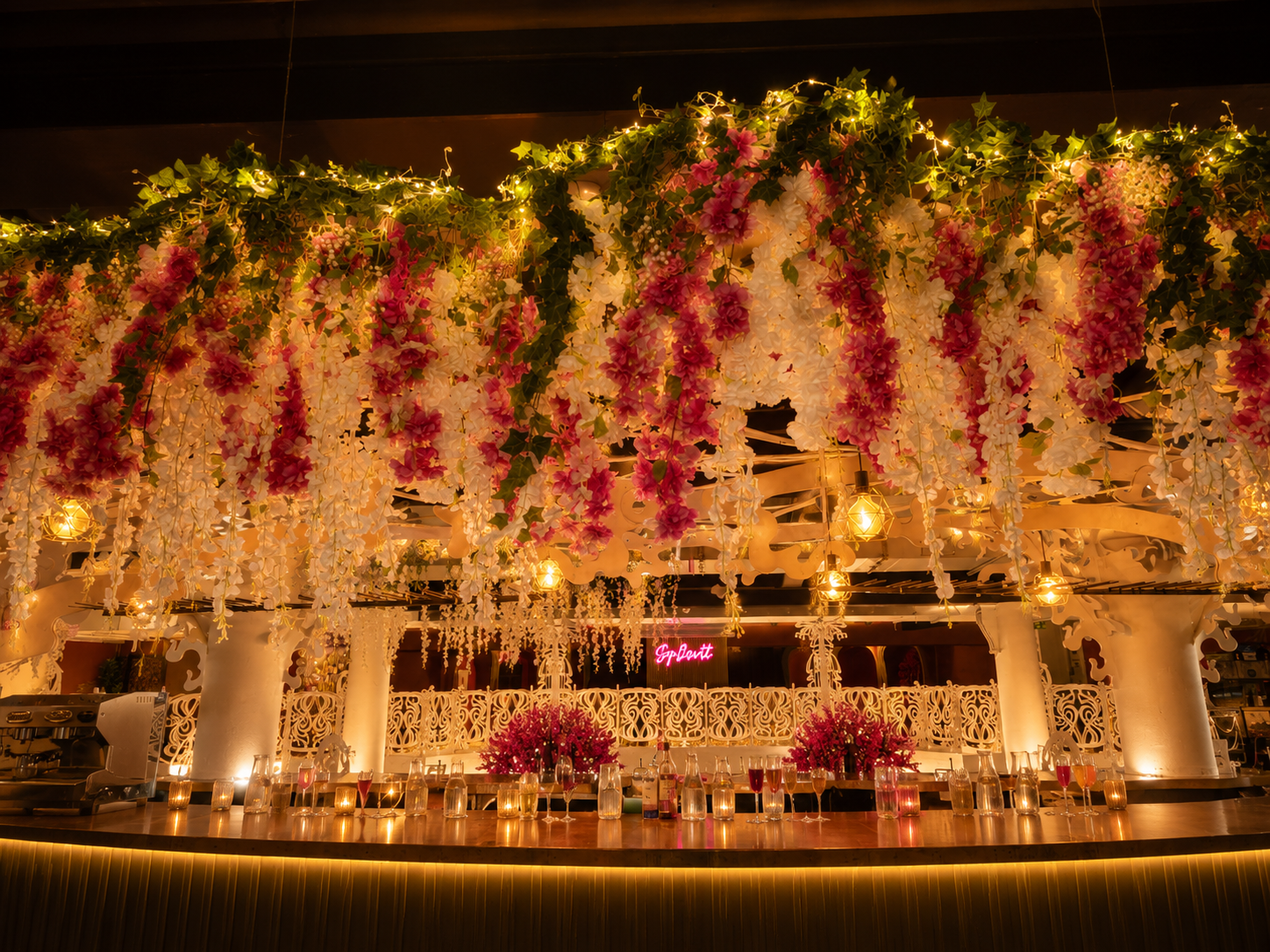 Bar at Opulent @ 35 Liverpool dressed with a lush white floral canopy overhead, set for an elegant wedding reception